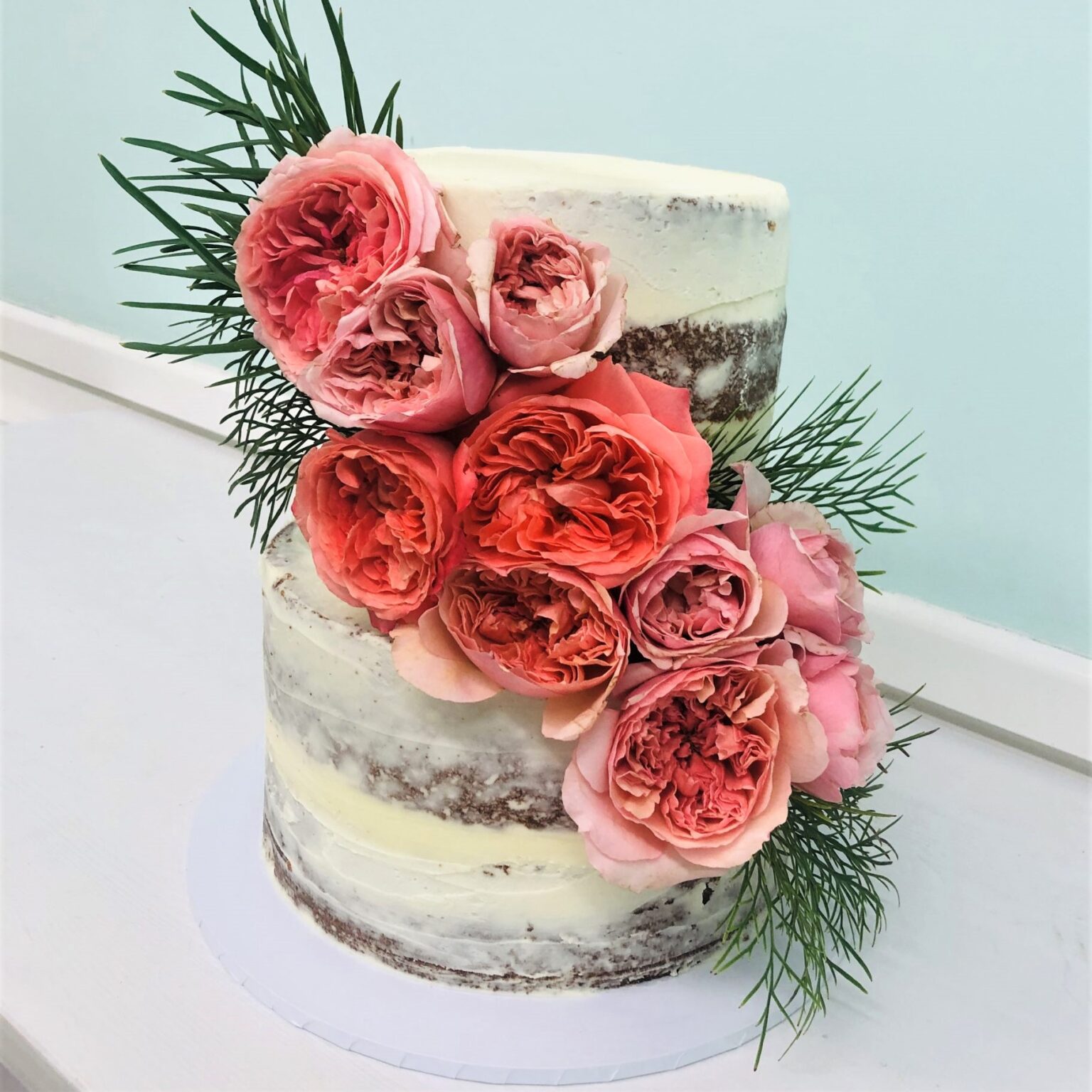 Naked Cake With Cascading Flowers The Cupcake Princess